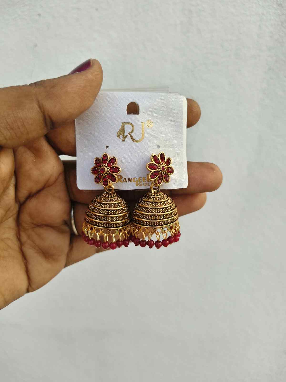 Gold-toned jhumka earrings 